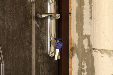 Keys in the door lock of a new construction apartment