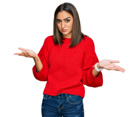 Beautiful brunette woman wearing casual winter sweater clueless and confused with open arms, no idea concept.