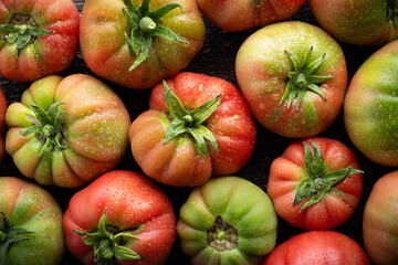 Delicious organic red tomatoes. Direct from the farm to the market..Top view..Fresh tomatoes, can be used as a background