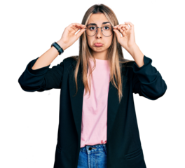 Hispanic young woman wearing elegant jacket and glasses depressed and worry for distress, crying angry and afraid. sad expression.