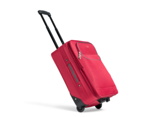 Red suitcase on wheels with the handle extended in the running position, isolated on a transparent background png.