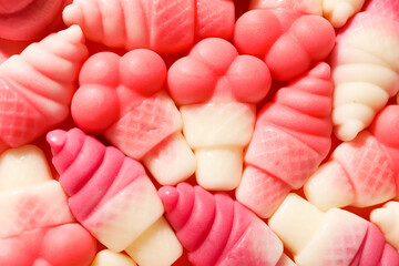 Pink jelly candies in the shape of ice cream, close up