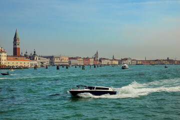 View of the Venetian Lagoon and active ship navigation on it, Venice, Italy.
