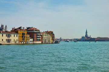 Fototapeta na wymiar View of the Venetian Lagoon and active ship navigation on it, Venice, Italy.