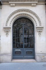 Fototapeta na wymiar Interesting door design, with nice shapes and materials. Shot in Paris.