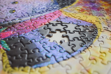 Selective focus of pieces puzzle, puzzle background.