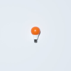 Orange Lightbulb With White Background