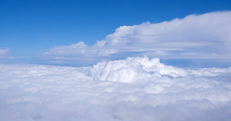 cloudscape from above. blue sky cumulus clouds. earth from above
