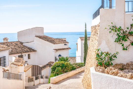 Altea old town with narrow streets and whitewashed houses. Architecture in small picturesque village of Altea near Mediterranean sea in Alicante province, Valencian Community, Spain