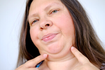 close up part face mature woman 55 years old, human fat neck, side view, double saggy chin, Aging...