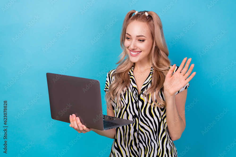 Sticker Portrait of charming friendly person arm palm waving hi video call wireless netbook isolated on blue color background