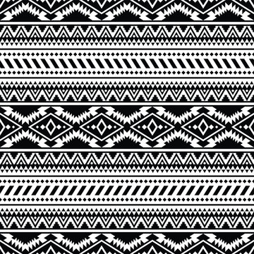 Seamless ethnic pattern design for fabric print. Style of Navajo tribal with Native American motif. Black and white colors.
