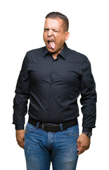 Fototapeta premium Handsome middle age arab business man over isolated background sticking tongue out happy with funny expression. Emotion concept.