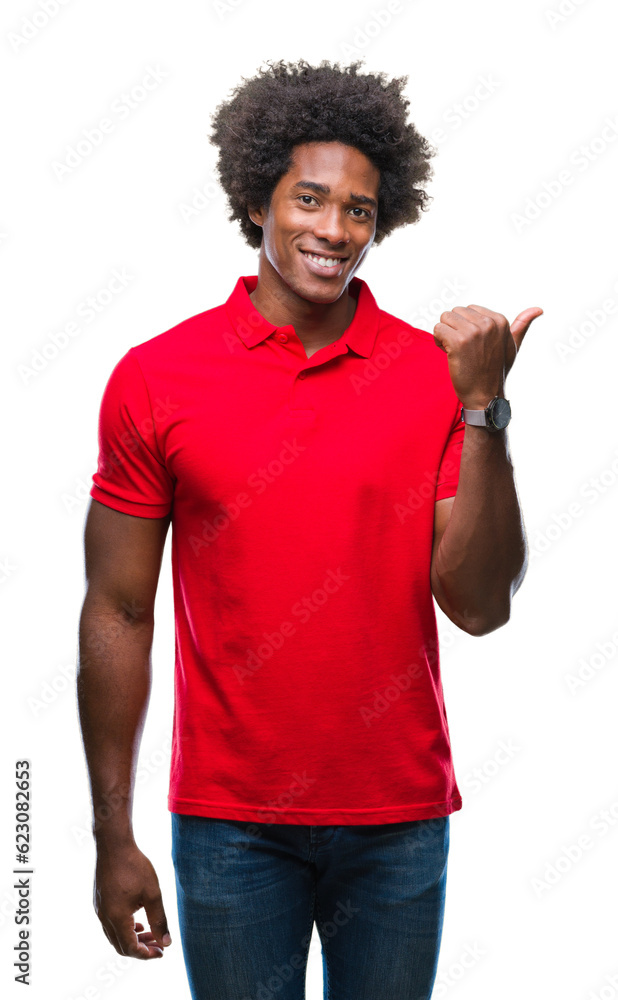 Sticker Afro american man over isolated background smiling with happy face looking and pointing to the side with thumb up.