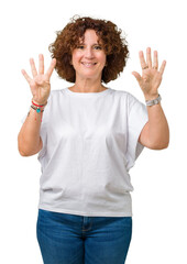 Beautiful middle ager senior woman wearing white t-shirt over isolated background showing and pointing up with fingers number nine while smiling confident and happy.