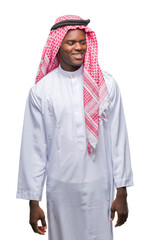 Young arabic african man wearing traditional keffiyeh over isolated background looking away to side...