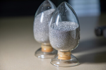 Close up of abrasive blasting media sample,cut wire shot peening,steel shot,Industrial concept	