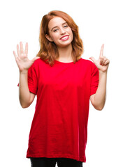 Fototapeta na wymiar Young beautiful woman over isolated background showing and pointing up with fingers number seven while smiling confident and happy.