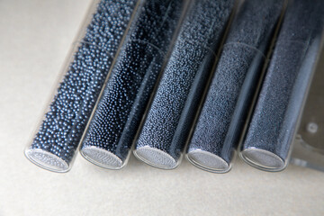 Close up of abrasive blasting media sample,cut wire shot peening,steel shot,Industrial concept	
