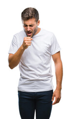 Young handsome man over isolated background feeling unwell and coughing as symptom for cold or bronchitis. Healthcare concept.