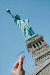 badge with the transgender flag and Lady Liberty
