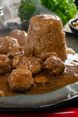 Minced meat balls in mushroom sauce.