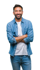 Adult hispanic man over isolated background happy face smiling with crossed arms looking at the...