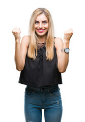 Fototapeta na wymiar Young beautiful blonde and blue eyes woman over isolated background celebrating surprised and amazed for success with arms raised and open eyes. Winner concept.