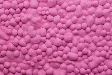 Abstract pink spongy background with a bubble texture. 