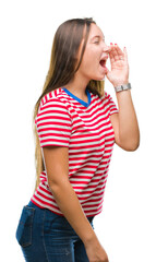 Young caucasian beautiful woman over isolated background shouting and screaming loud to side with hand on mouth. Communication concept.