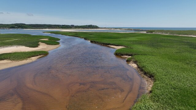 Beautiful, green, peaceful inlet marsh by the Atlantic ocean at Cape Cod National Seashore a great family summer vacation destination