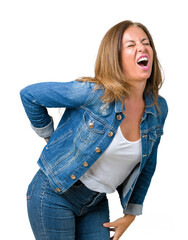 Beautiful middle age woman wearing casual denim jacket over isolated background Suffering of backache, touching back with hand, muscular pain