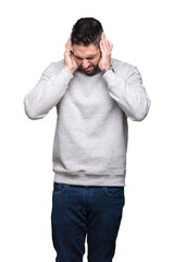 Fototapeta premium Young handsome man wearing sweatshirt over isolated background with hand on head for pain in head because stress. Suffering migraine.