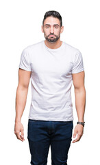Fototapeta premium Young man wearing casual white t-shirt over isolated background depressed and worry for distress, crying angry and afraid. Sad expression.