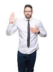 Young handsome business man wearing glasses over isolated background Swearing with hand on chest and open palm, making a loyalty promise oath