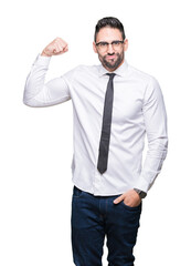 Young handsome business man wearing glasses over isolated background Strong person showing arm muscle, confident and proud of power