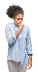 Young afro american woman over isolated background feeling unwell and coughing as symptom for cold or bronchitis. Healthcare concept.