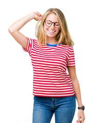 Fototapeta premium Beautiful young woman wearing glasses over isolated background Dancing happy and cheerful, smiling moving casual and confident listening to music