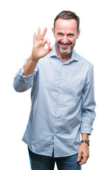 Middle age hoary senior business man over isolated background smiling positive doing ok sign with hand and fingers. Successful expression.