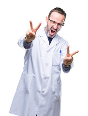 Middle age senior hoary professional man wearing white coat over isolated background smiling looking to the camera showing fingers doing victory sign. Number two.