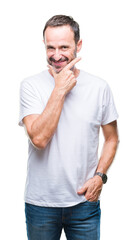 Middle age hoary senior man wearing white t-shirt over isolated background looking confident at the camera with smile with crossed arms and hand raised on chin. Thinking positive.