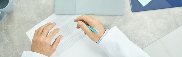 Elderly woman having online consultation with doctor