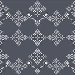 Ethnic geometric fabric pattern Cross Stitch.Ikat embroidery Ethnic oriental Pixel pattern green gray background. Abstract,vector,illustration. Texture,clothing,frame,decoration,motifs,silk wallpaper.