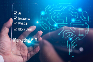 businessman holding a smartphone at the word marketing 6.0 marketing strategy concept 2023 marketing 6.0 , Ai , Metaverse, web 3.0, Block chain.