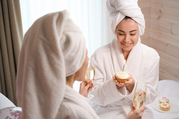 Excited lady celebrating birthday with friend of her