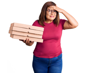 Middle age latin woman holding delivery pizza box stressed and frustrated with hand on head, surprised and angry face