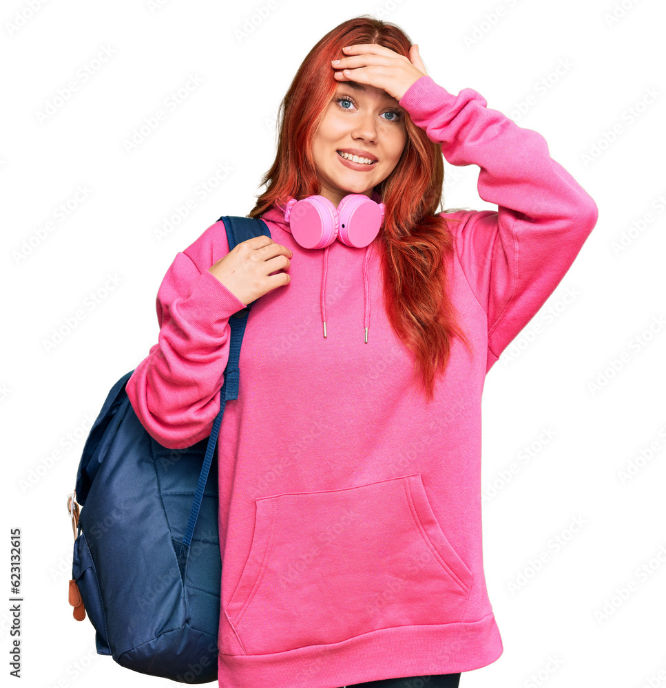 Poster young redhead woman holding student backpack and books stressed and frustrated with hand on head, su