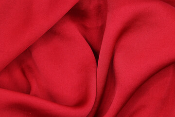 Backgrounds and textures of beautiful deep black and scarlet red silk fabric