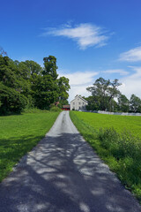 Part of the Pilgrim Road to Nidaros, Norway, passing by the cultural landscape of Hoff at Toten in summer.