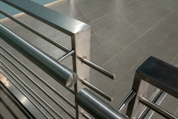 modern building balustrade, detail in polished and satin steel, the parapet protects from falling....